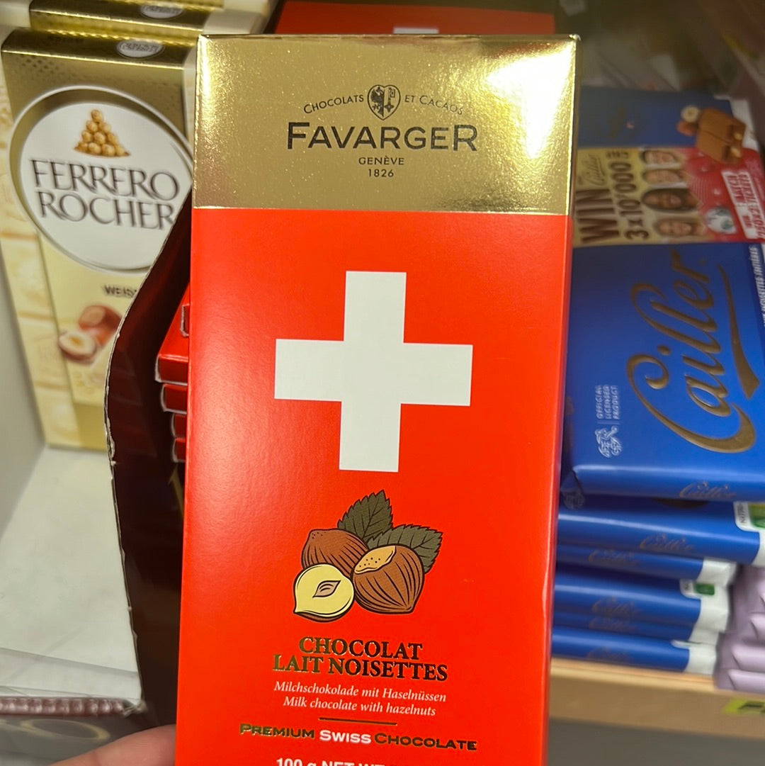 CHOCOLAT
LAIT NOISETTES
Milchschokolade mit Haselnüssen
Milk chocolate with hazelnuts
BREMIUM SWISS CHOSOLATE
100 g NET WT 3.5 OZ