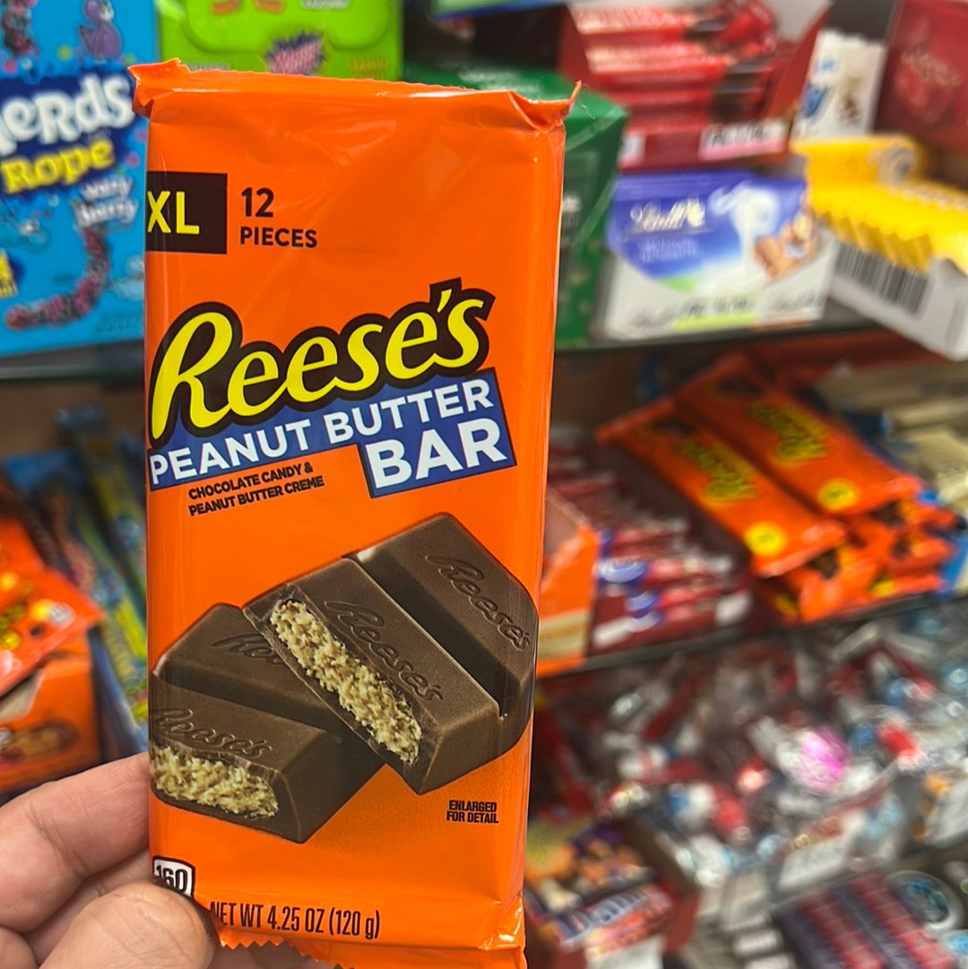 XL
12
PIECES
Reese's
PEANUT BUTTER
CHOCOLATE CANDY &
BAR
PEANUT BUTTER CREME 120g